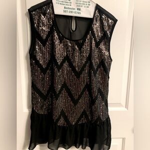 Women’s Large sleeveless sequined top with see thru material. Preloved
